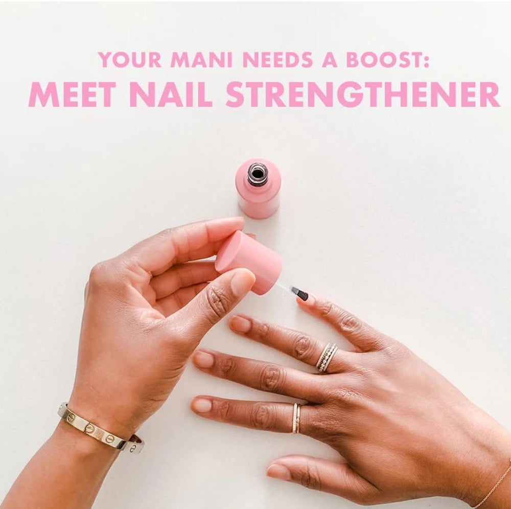 Olive & June Nail Strengthener on nails with a glossy, strengthened finish.