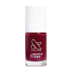 Olive & June Quick Dry Cabernet bottle glows with rich color
