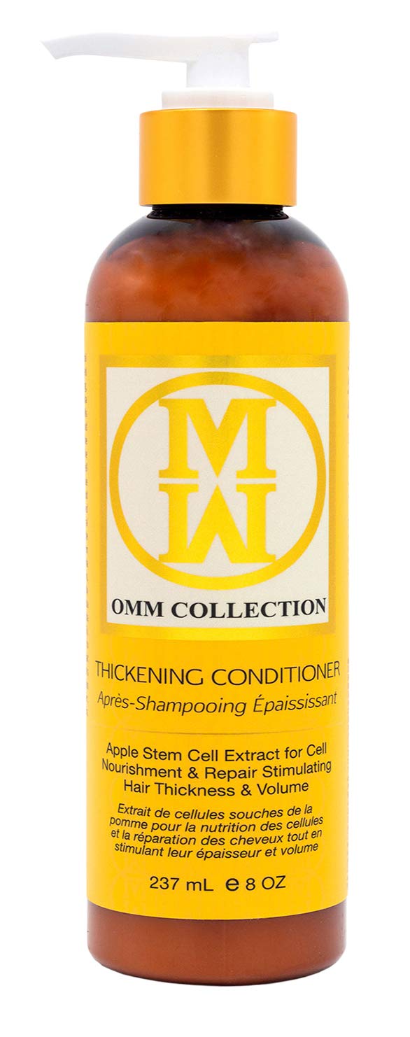 OMM Collection hair repair conditioner bottle shows a hydrating formula for dry, damaged hair.
