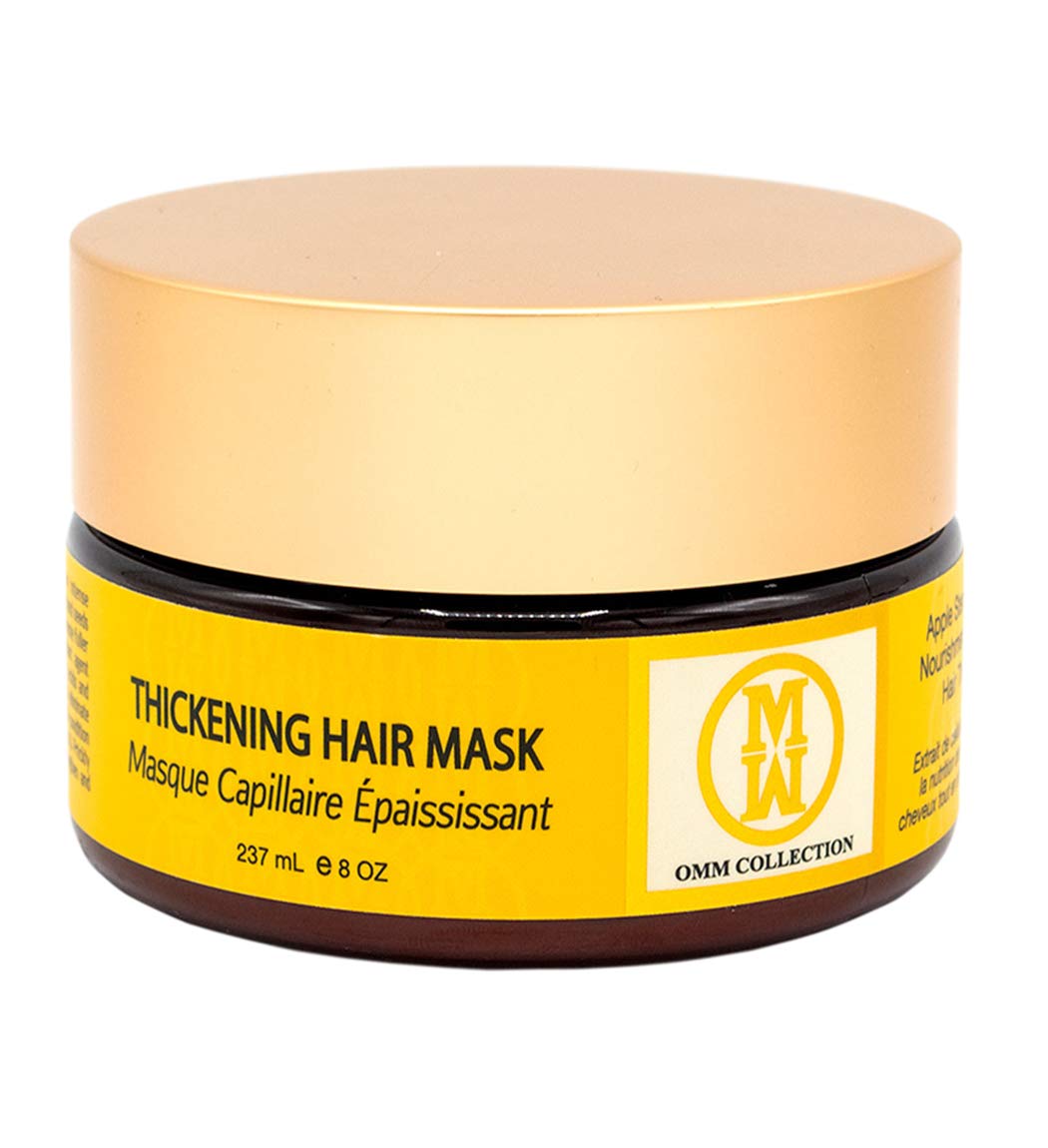 OMM Collection Natural Hair Thickening Mask packaging highlights vegan formula and premium care.