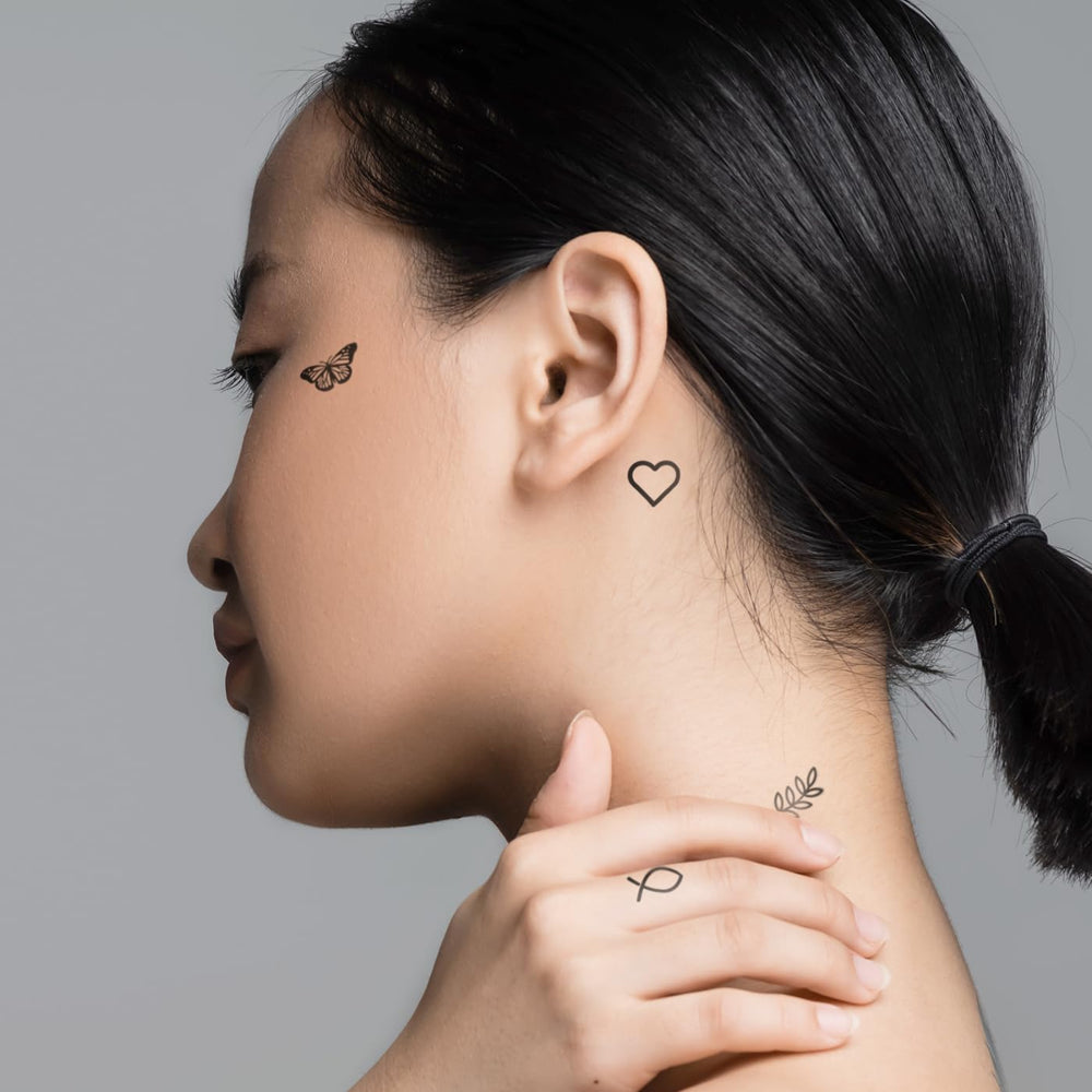 One Grace tiny ankle tattoo black and white, perfect for subtle seasonal style.
