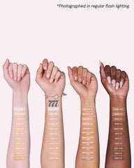One Size Turn Up The Base Light 1 swatch on skin for rosy undertones