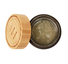 ONE11 ozonated olive oil label-front highlights organic ingredients and scent options.