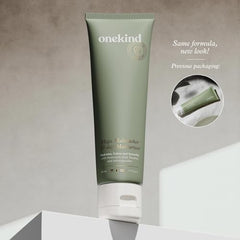 Onekind Mega Multitasker cream swirls on skin for smooth hydration.