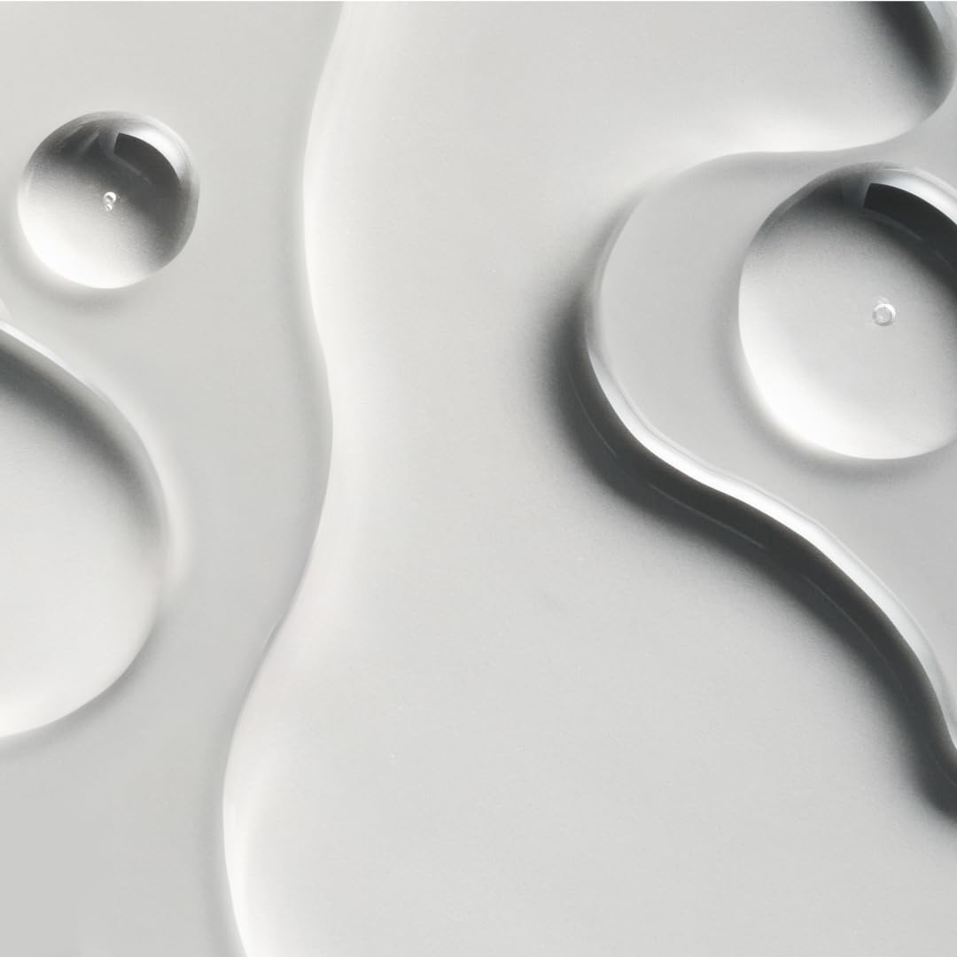 oneskin HAIR OS-01 droplet application demonstrating easy daily use on scalp.