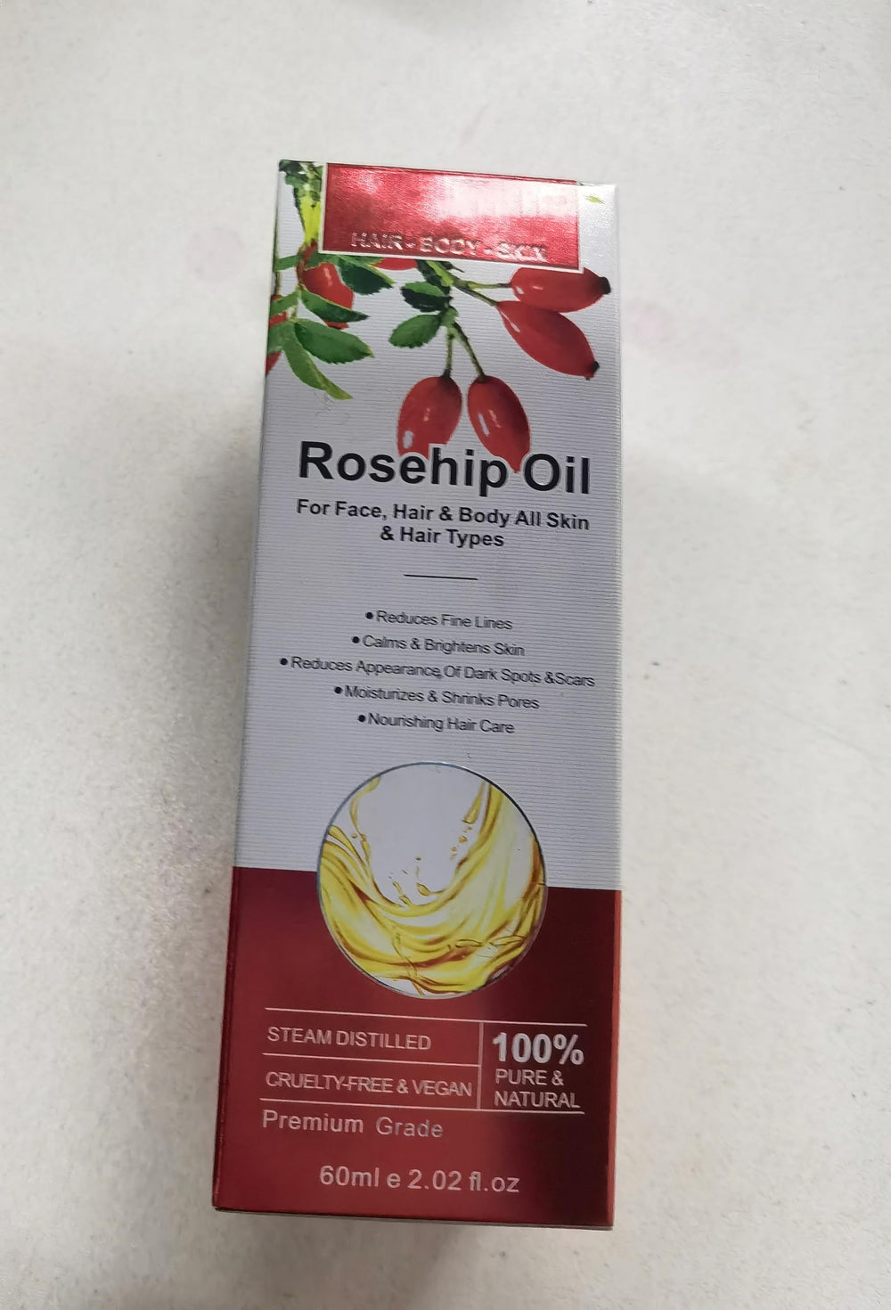 Onznoz Rosehip Oil applied to hair ends for added shine.