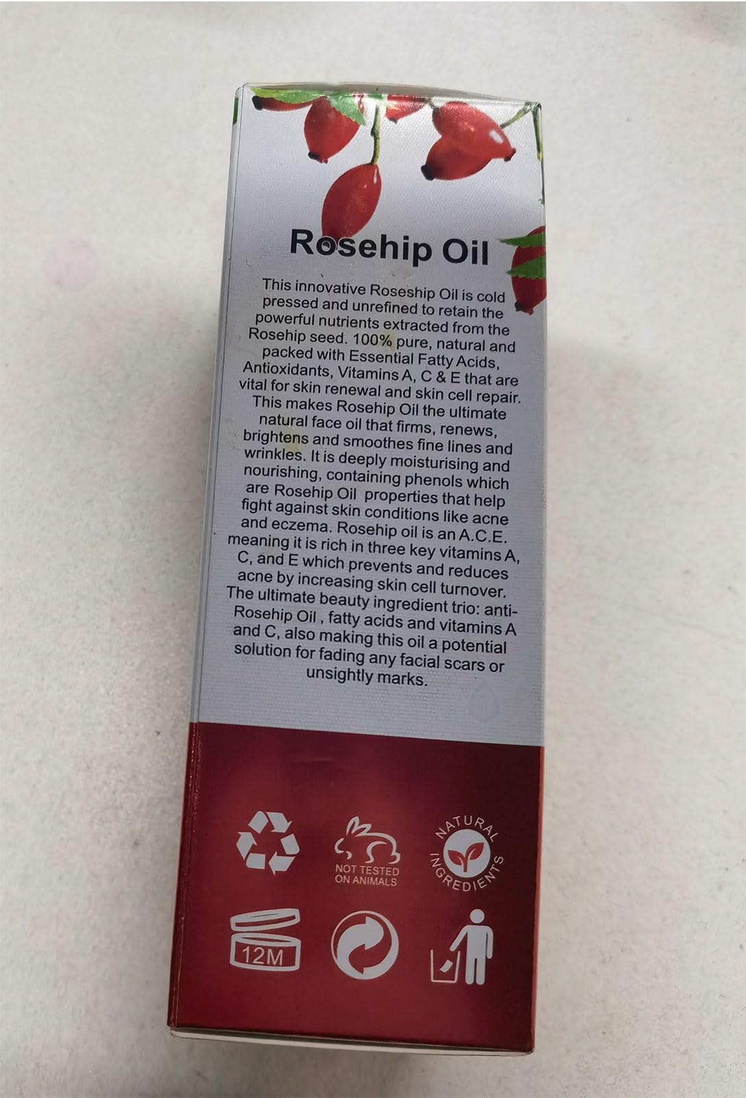 Onznoz Rosehip Oil packaging with label and branding.