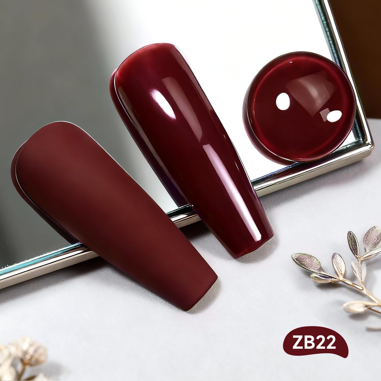Close-up of the OpenLive brush applying quick-dry dark red polish.