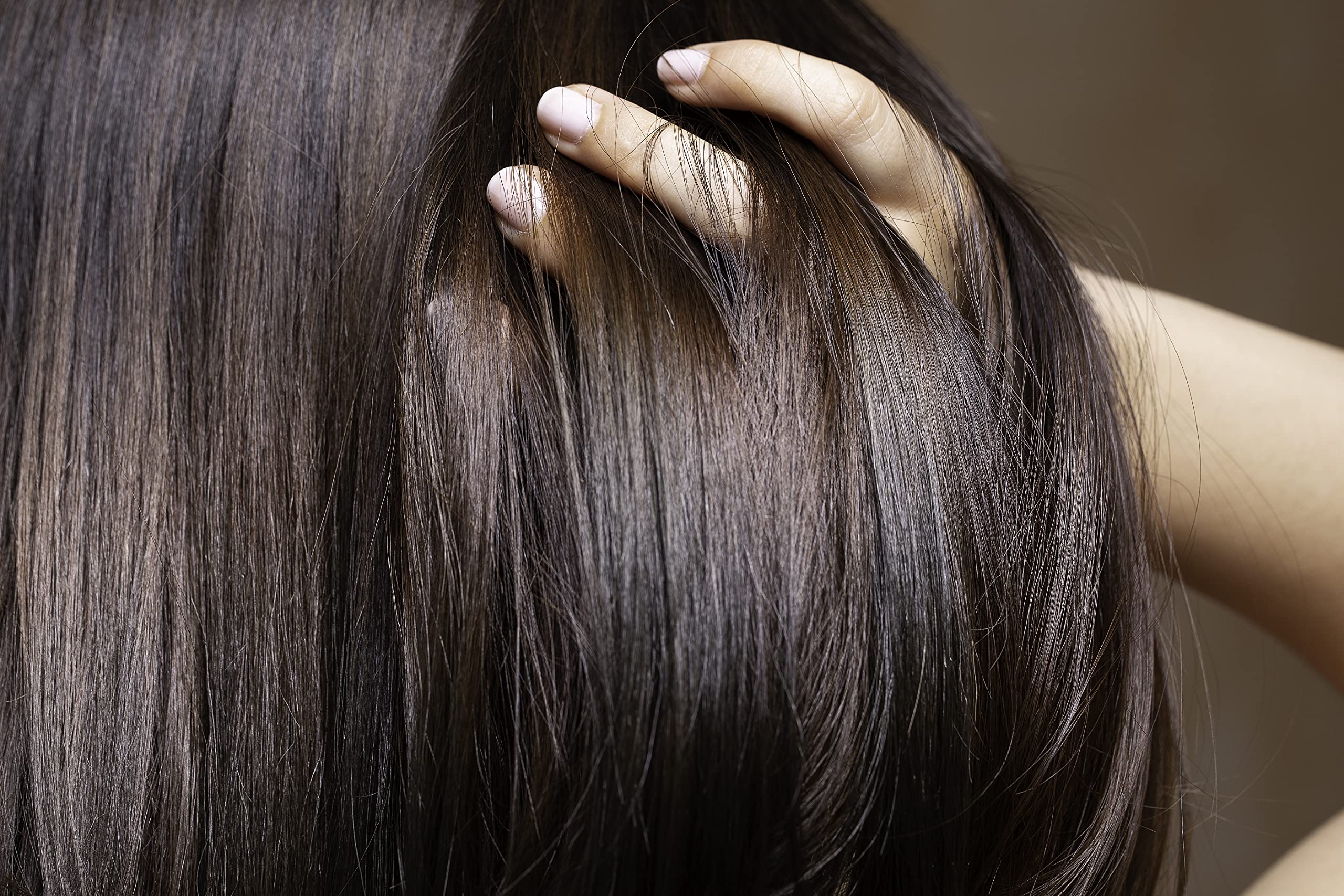 OPO Rice Water Mixture hair mist in use on damp hair