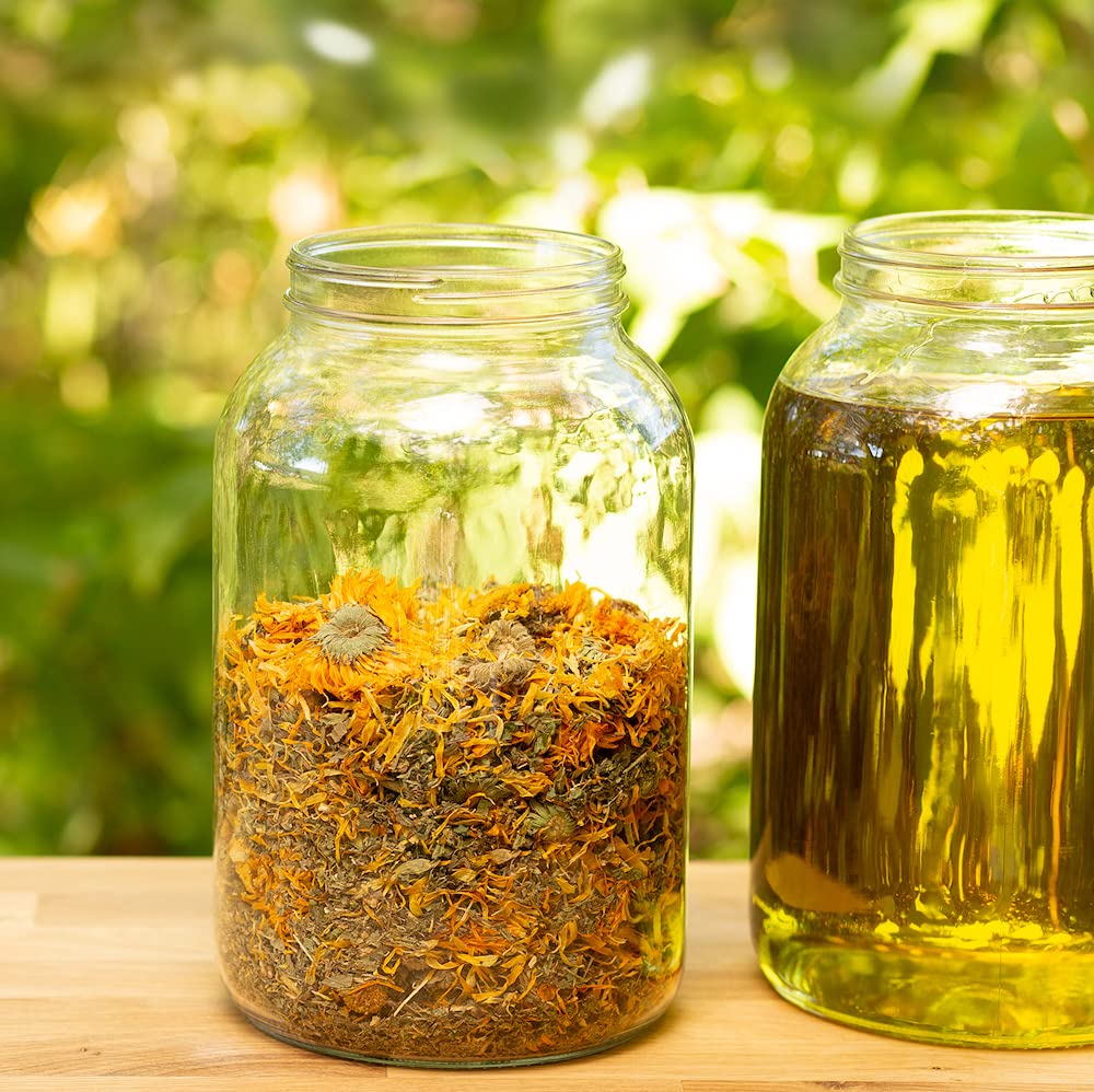 Ora's Amazing Herbal calendula oil texture close-up ready for cleansing use