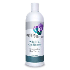 Organic Excellence Wild Mint Conditioner bottle pouring for lightweight hydration.