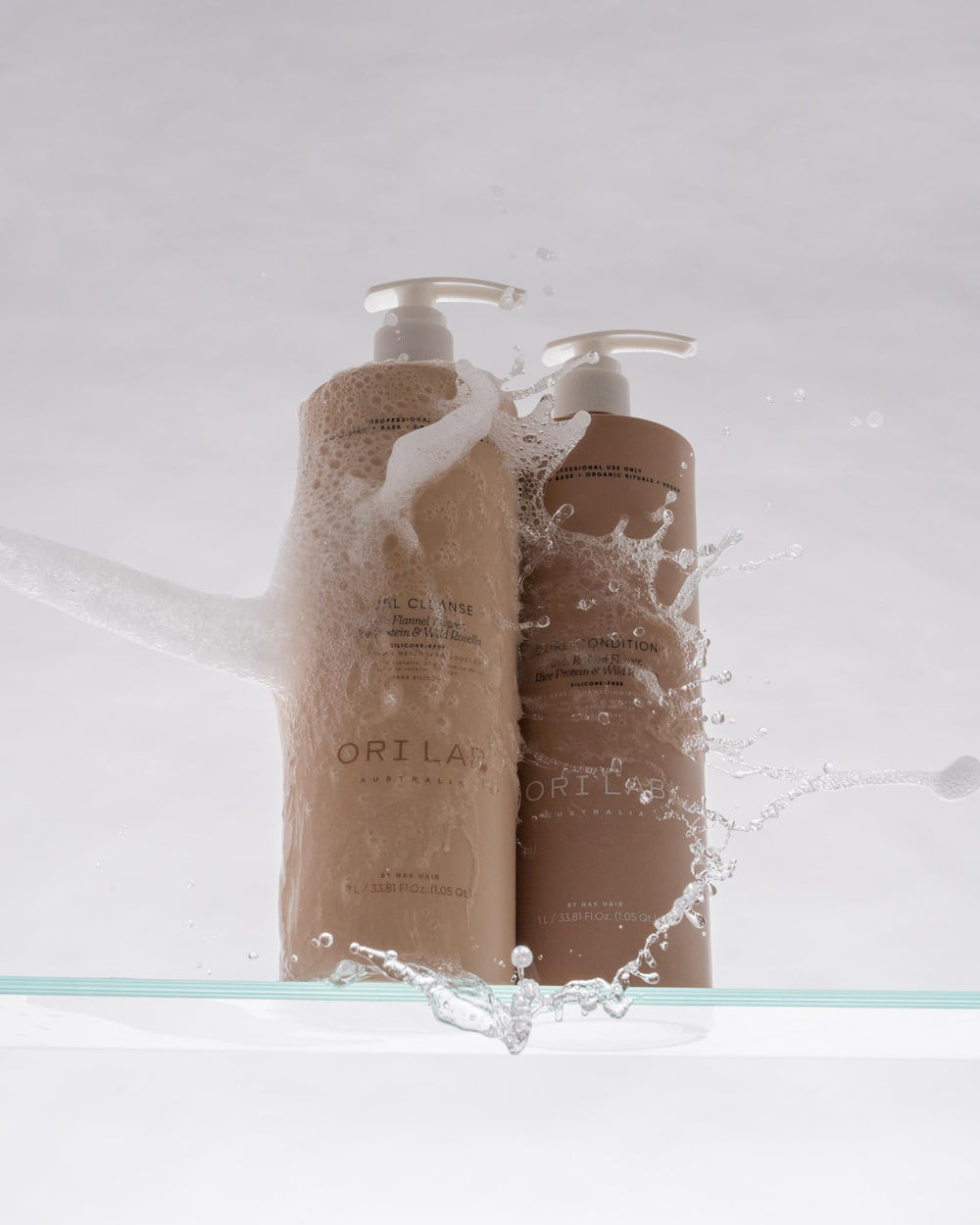 ORI LAB Curl Cleanse pour demonstrates easy application for curls