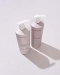 ORI LAB Restore Cleanse bottle in a bathroom scene, signaling a calm routine for color-treated hair.