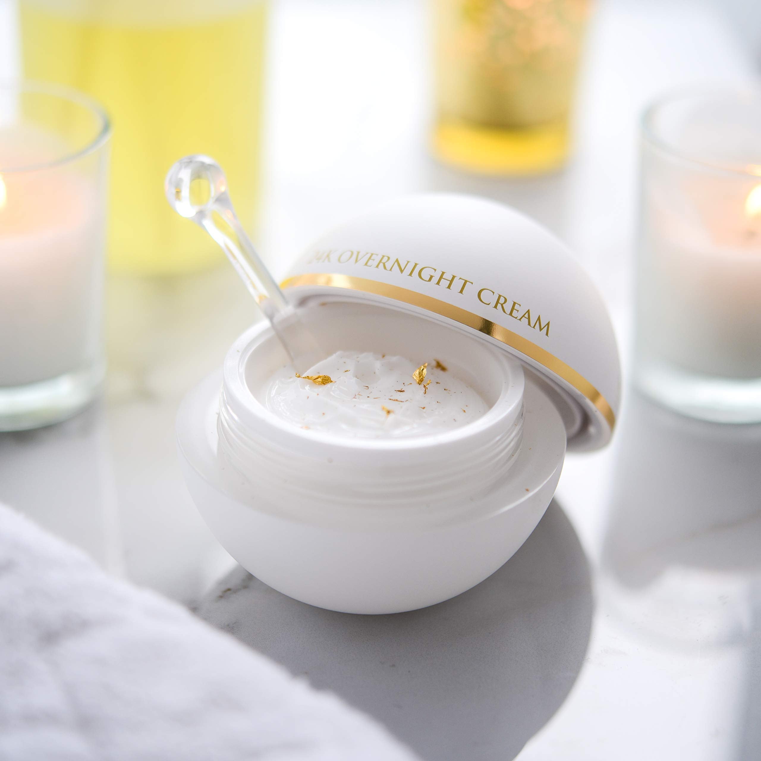Nightstand setup with Orogold skincare for your routine.