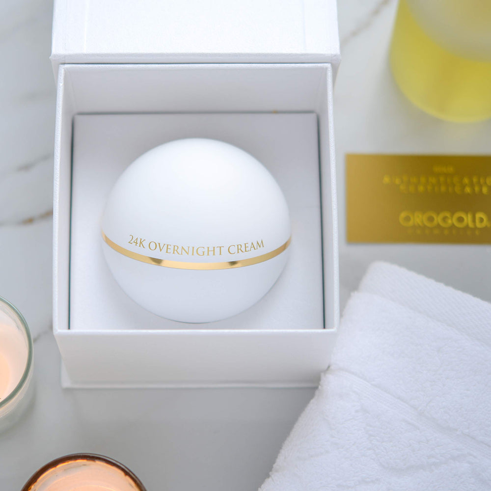 Orogold overnight cream applied on skin during nightly routine.