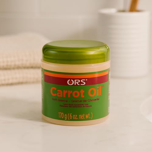 Dispensing the ORS Carrot Oil Hair Cream shows easy, controlled application.