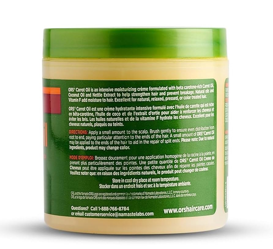 Close-up of ORS Carrot Oil Hair Cream texture for smooth, fast-absorbing moisture.