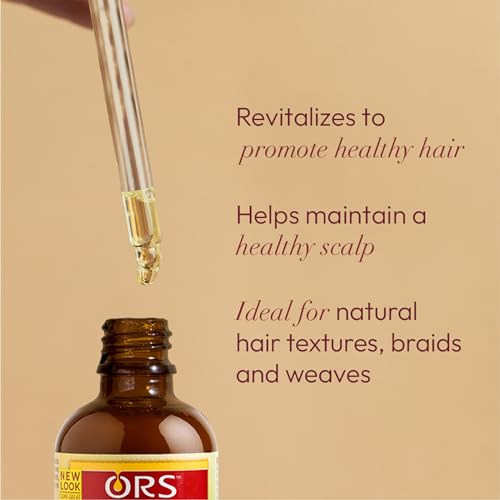 Applying ORS HAIRestore as a spot treatment for thinning areas.