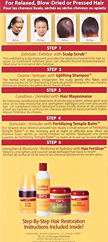 ORS HAIRestore Temple Balm applicator close-up ready for targeted temple use.