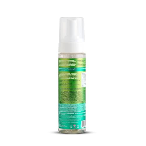 ORS Olive Oil Max Moisture Mousse being applied to damp curls for definition.