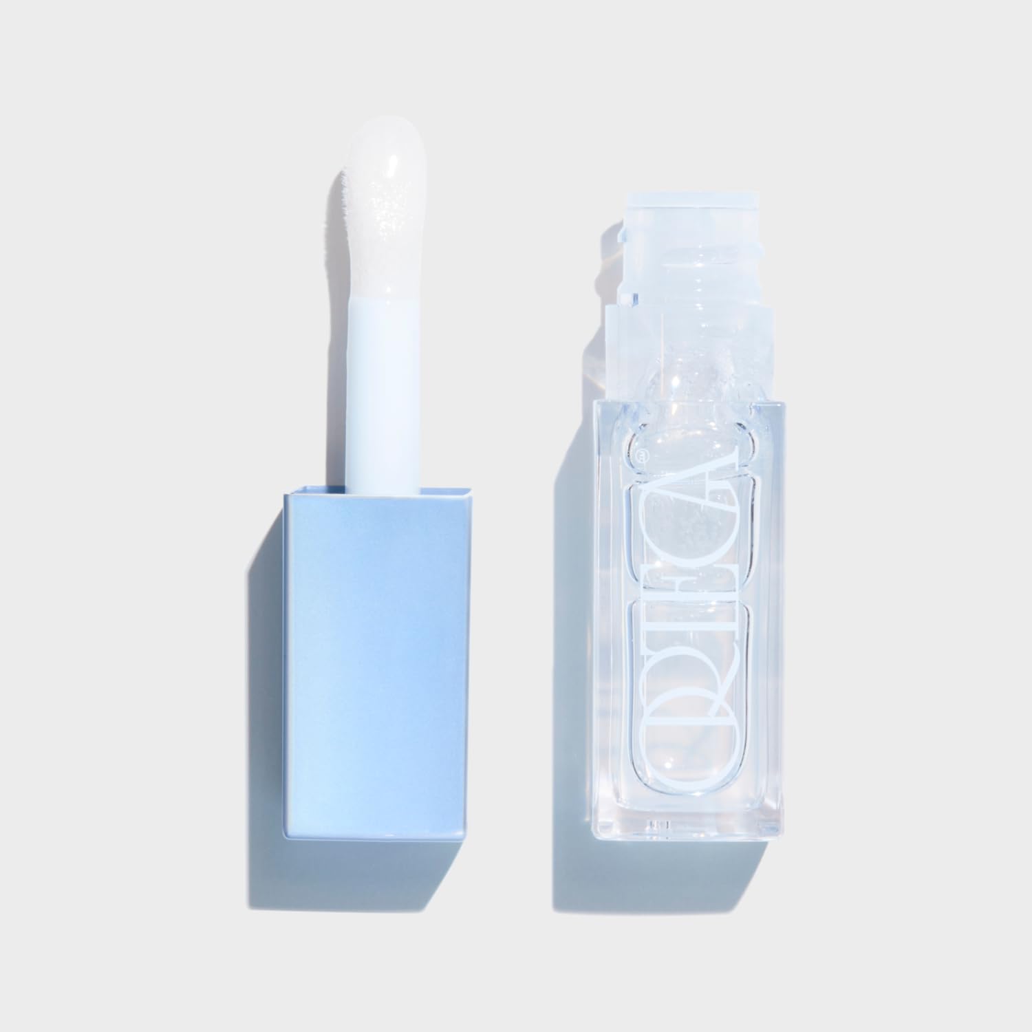 Ortega Beauty Liquid Icon Hyper Gloss with blue agave ingredient highlight