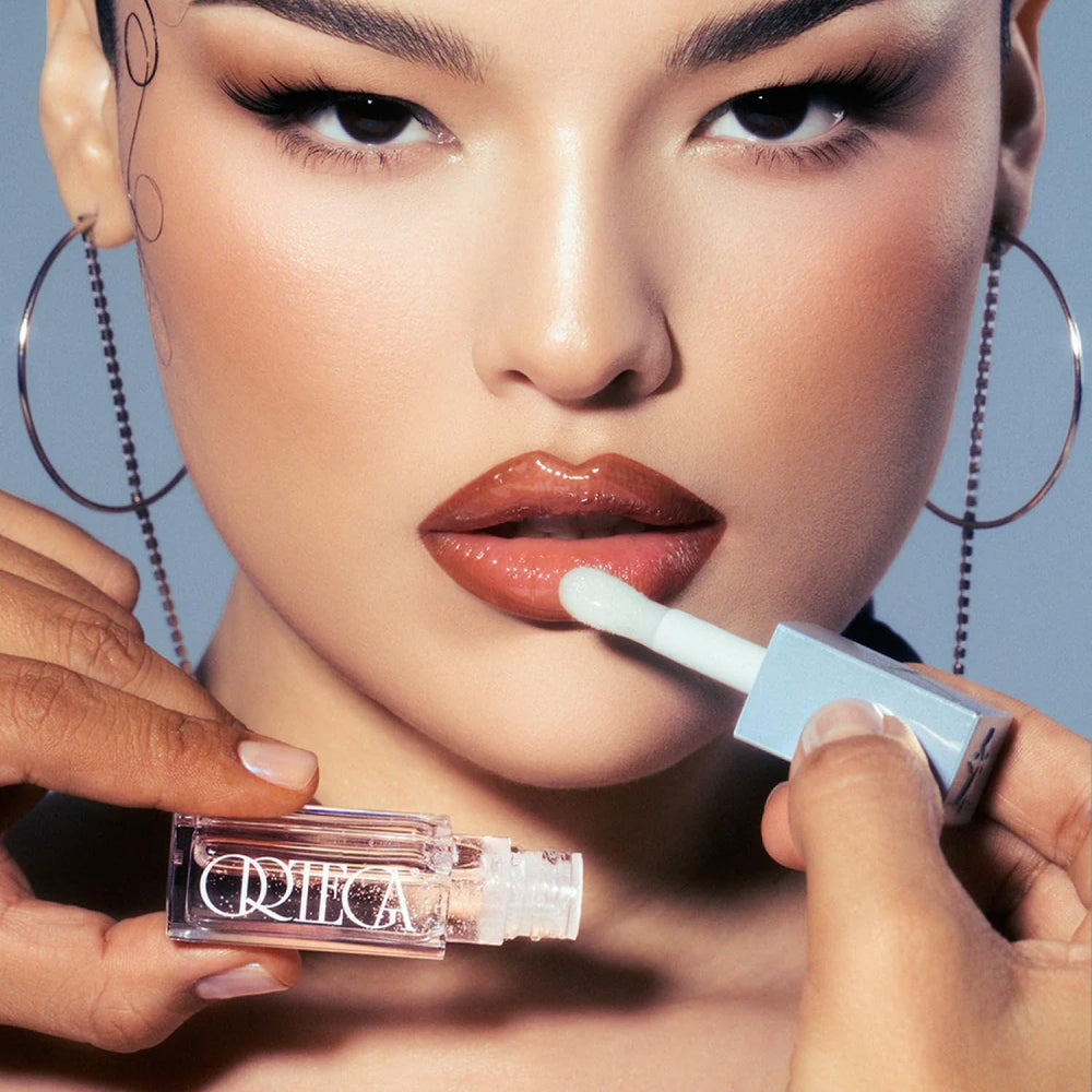 Ortega Beauty Hyper Gloss on lips with clear shine