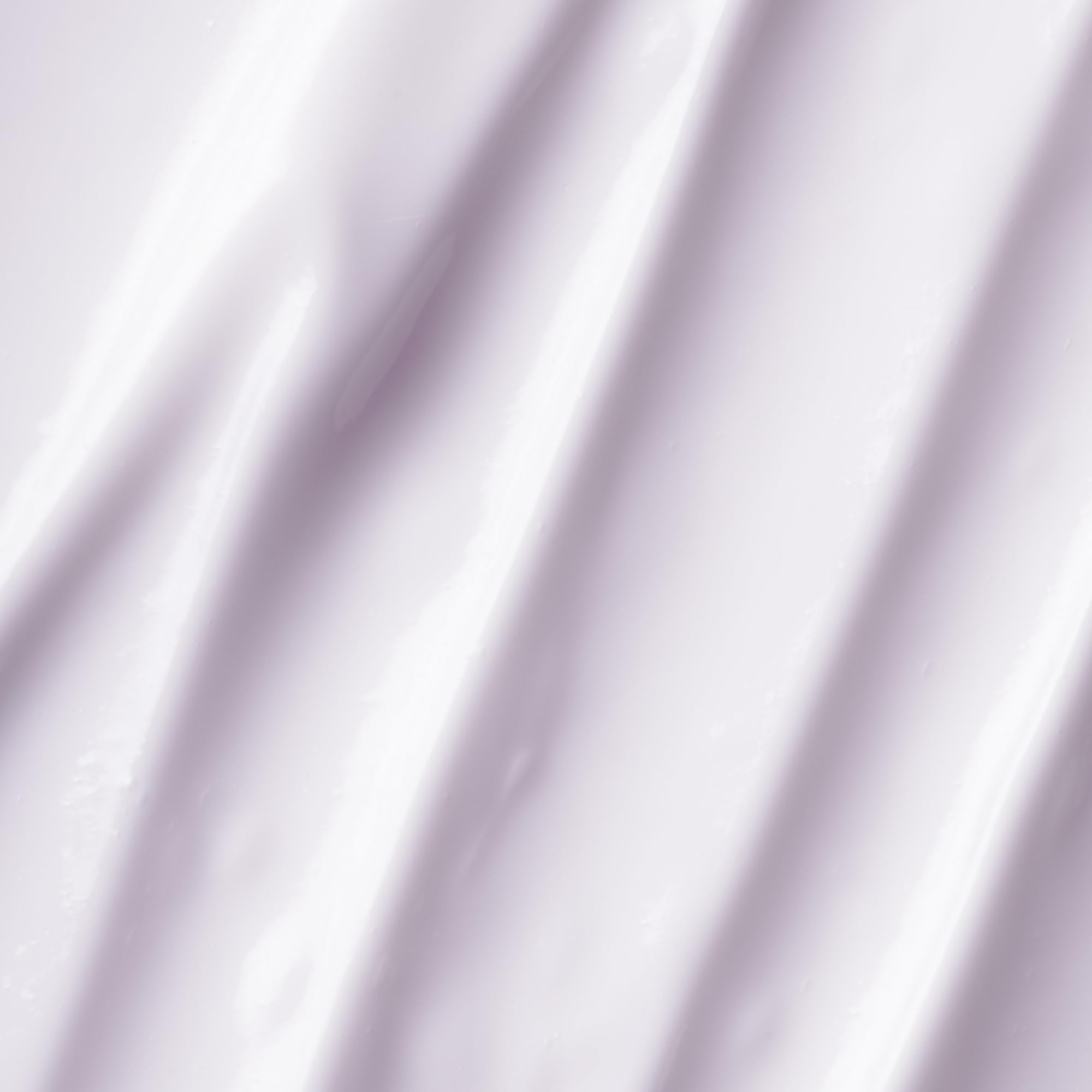 Closeup of Dream Night Cream texture showing creamy, plump coverage.