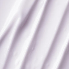 Closeup of Dream Night Cream texture showing creamy, plump coverage.