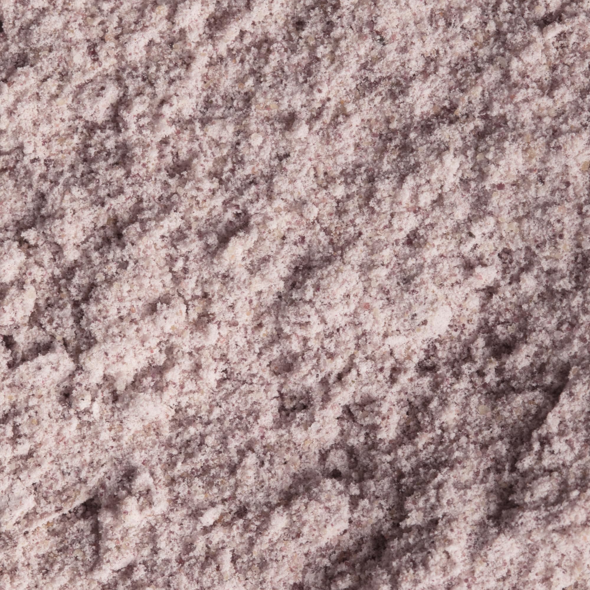 Pour action of OSEA Gigartina Therapy Bath Soak shows fizzing minerals for a relaxing ritual.