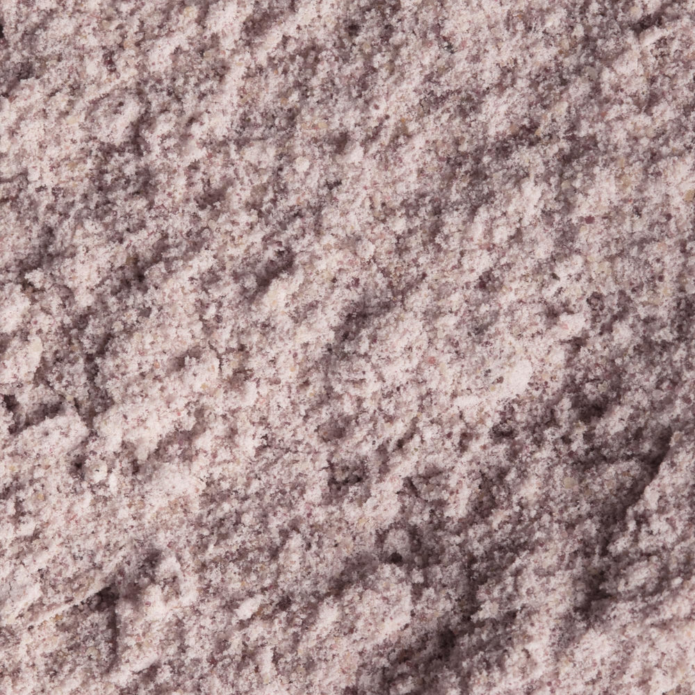 Pour action of OSEA Gigartina Therapy Bath Soak shows fizzing minerals for a relaxing ritual.