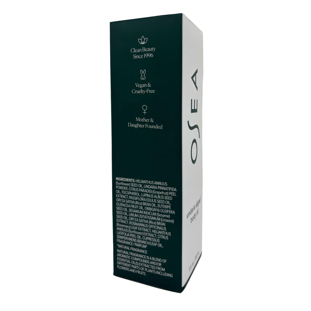 Bathroom setting with OSEA Undaria Algae Body Oil suggests daily hydration ritual