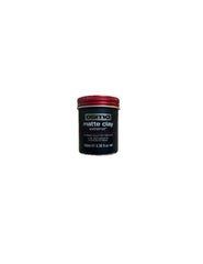 Hands applying Osmo clay to create natural texture without shine