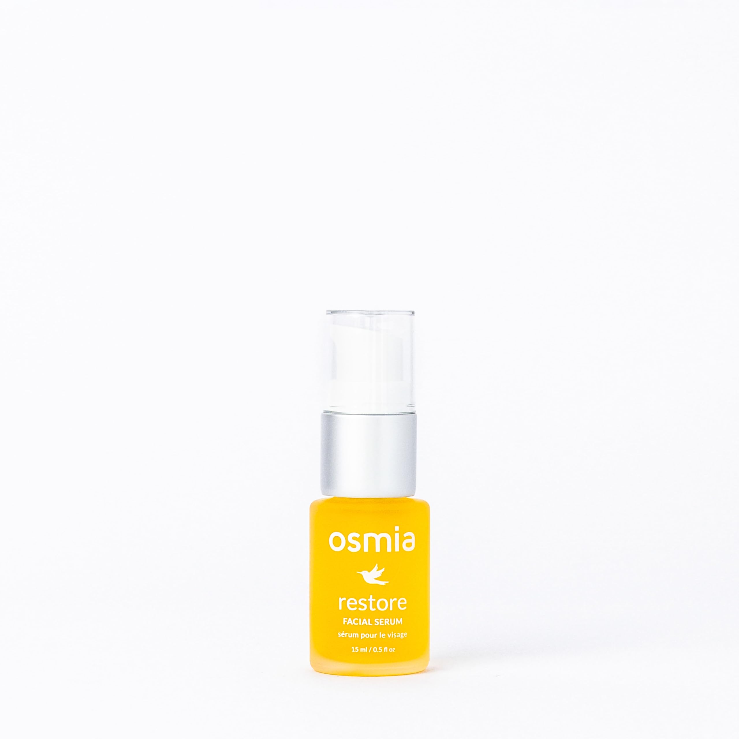Osmia Natural Restore Serum carrot-seed oil dropper highlights nourishing texture enhancement.