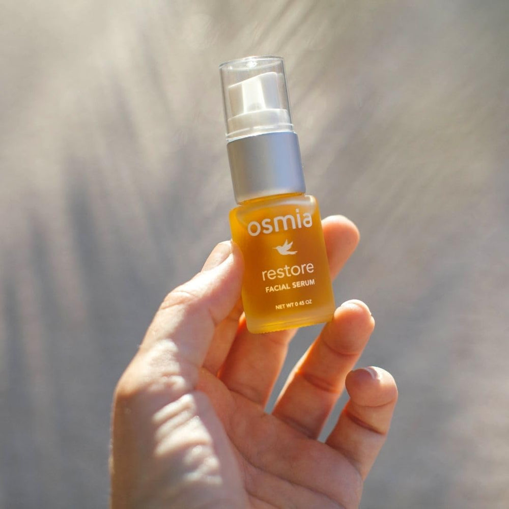 Osmia Natural Restore Serum dark glass bottle protects ingredients from light.