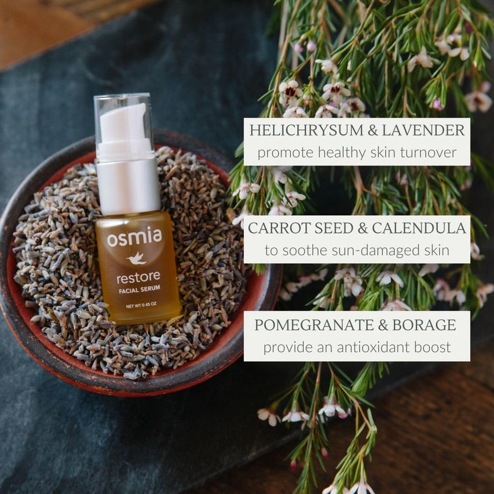 Osmia Natural Restore Serum pomegranate oil bottle emphasizes antioxidant-rich shine.