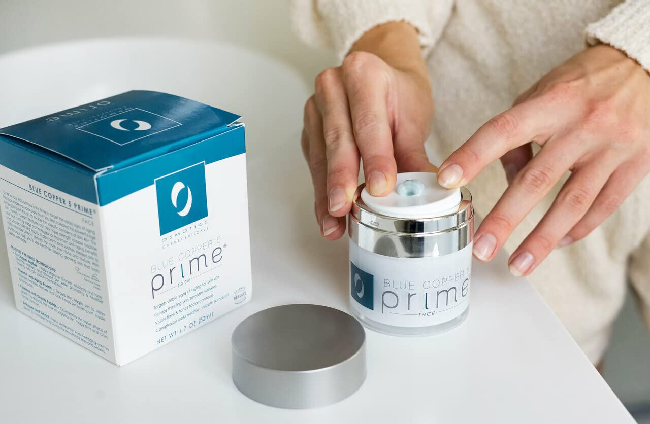 Application swatch of Osmotics Blue Copper 5 Prime Face Cream demonstrating quick absorption.