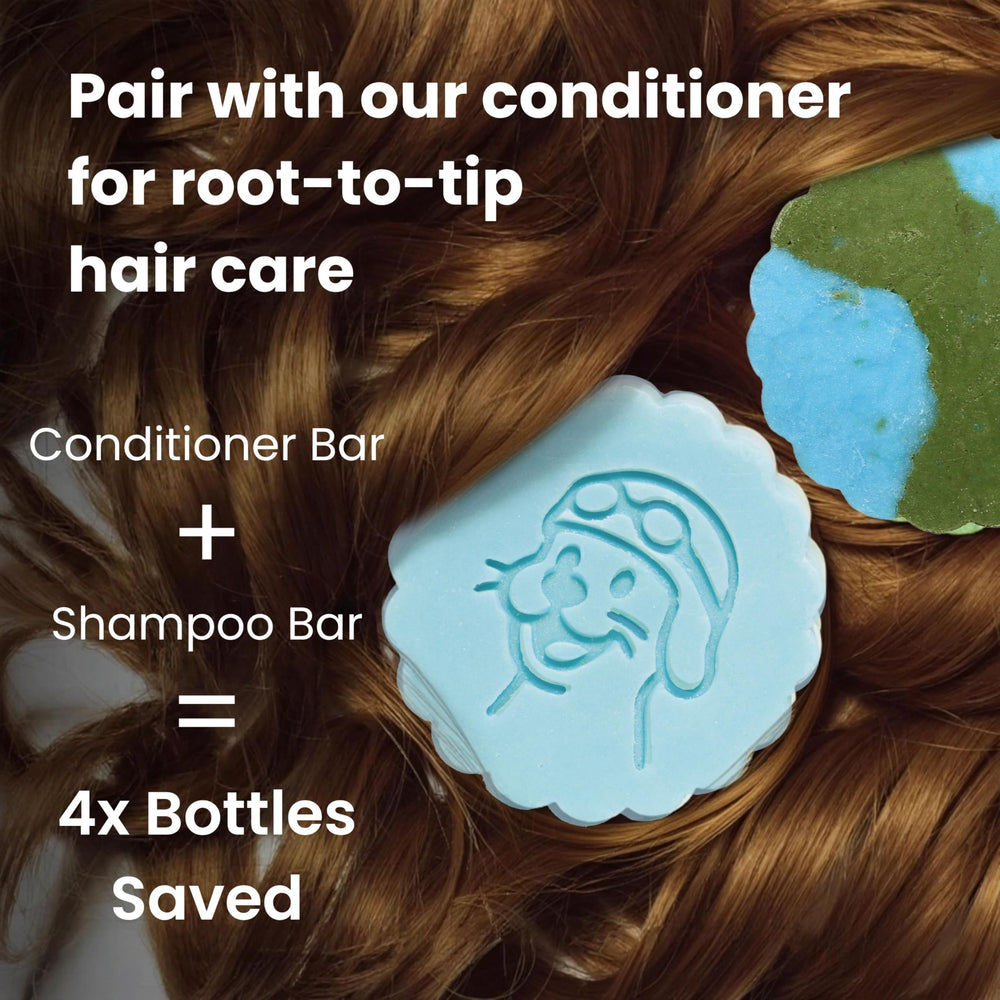 Hands holding Otter Co conditioner bar for easy shower use