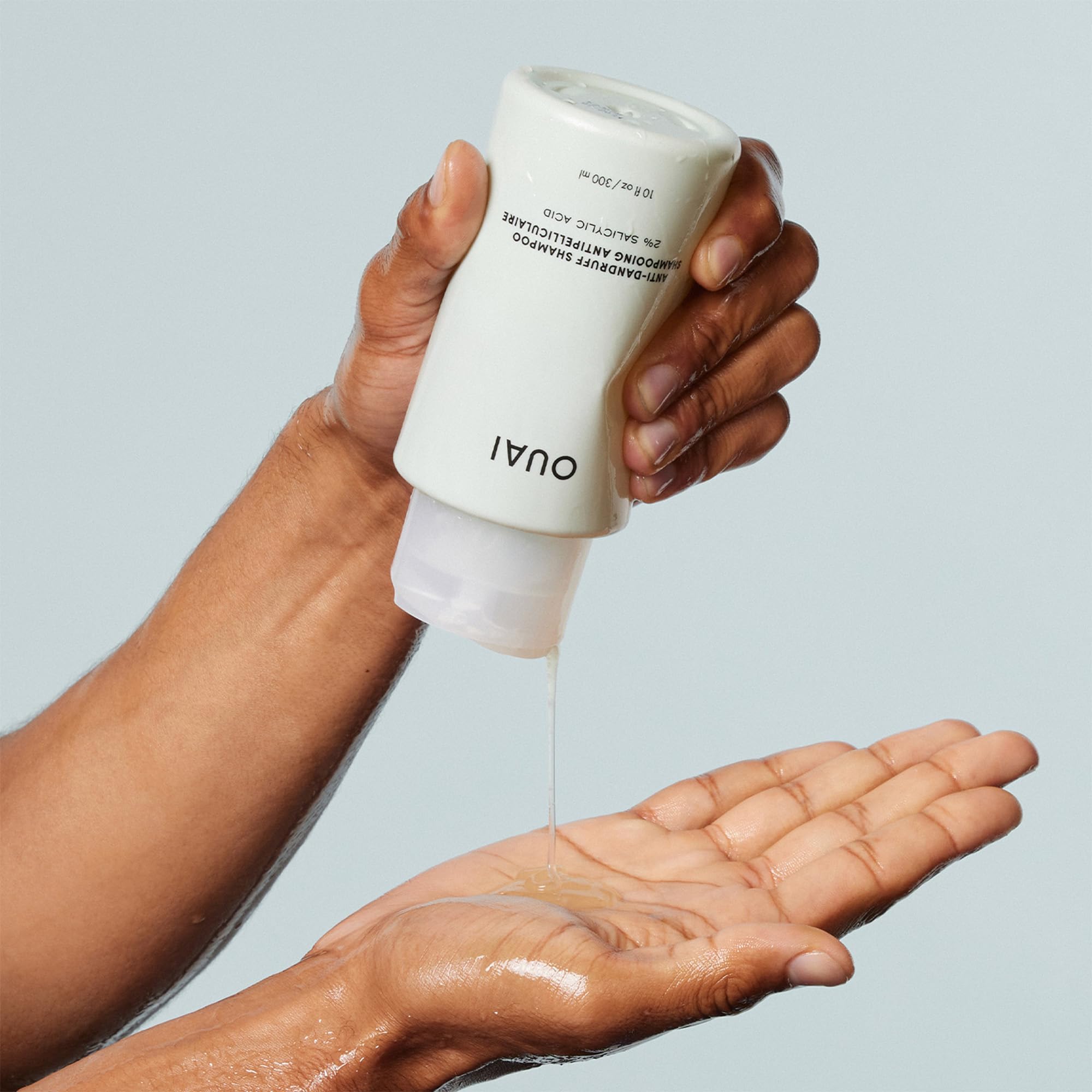 OUAI packaging on shelf communicates premium yet accessible hair care