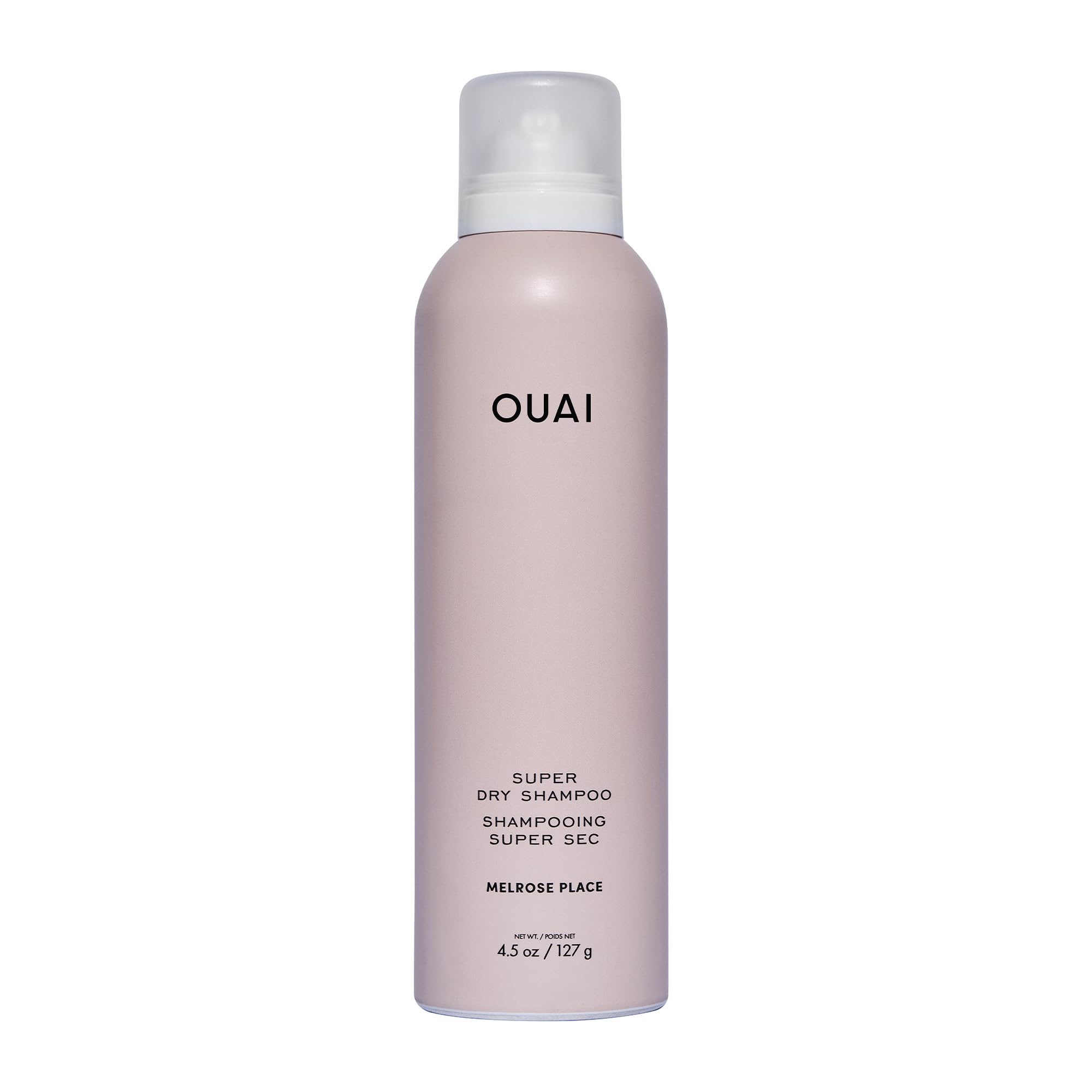 OUAI Super Dry Shampoo bottle ready to refresh roots.