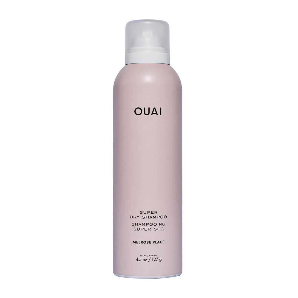 OUAI Super Dry Shampoo bottle ready to refresh roots.