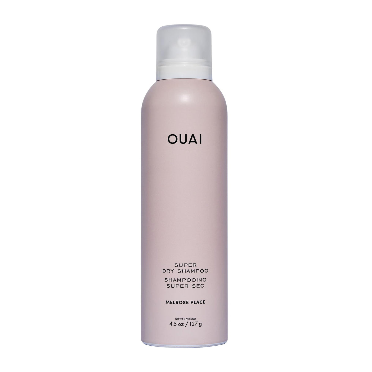 OUAI Super Dry Shampoo bottle ready to refresh roots.