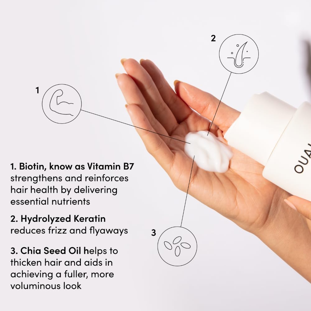 OUAI travel-size packaging close-up for convenient on-the-go care