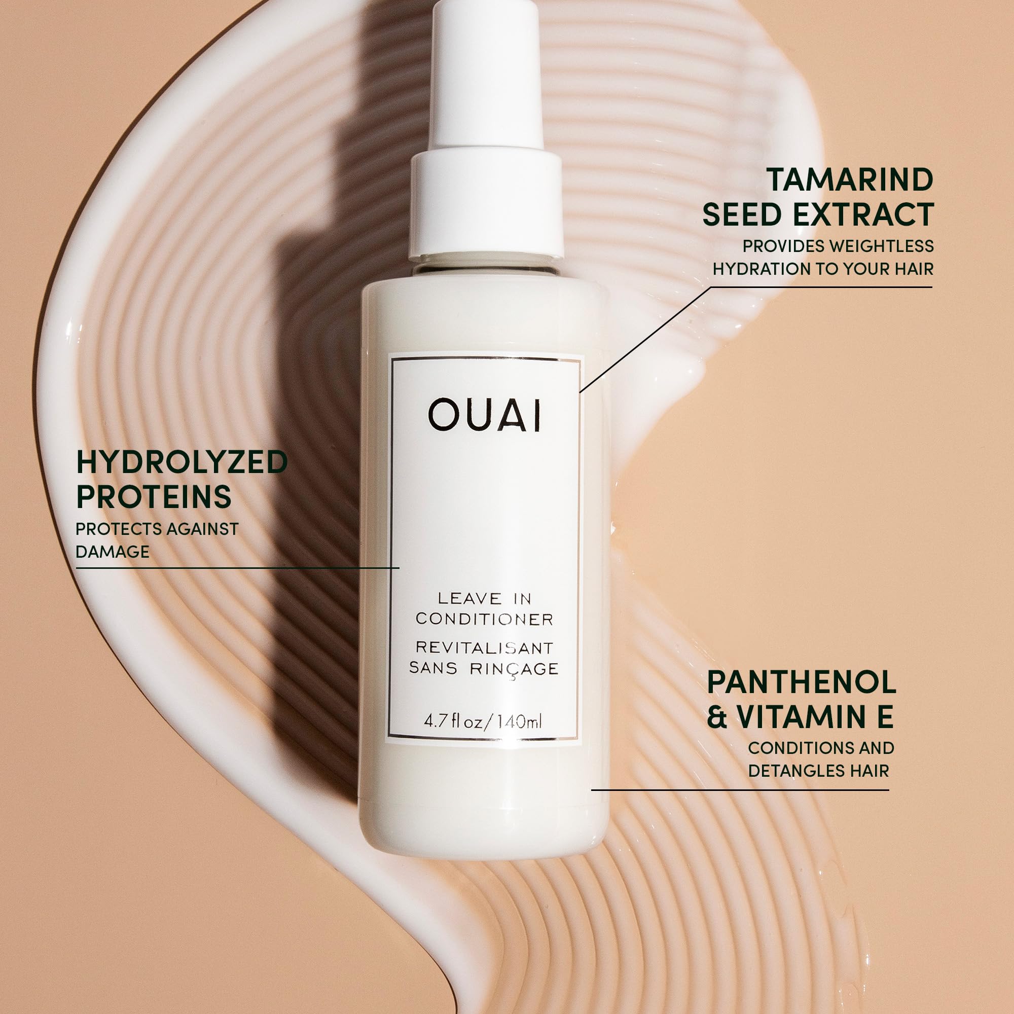 OUAI Wave Spray being misted to add volume and texture.