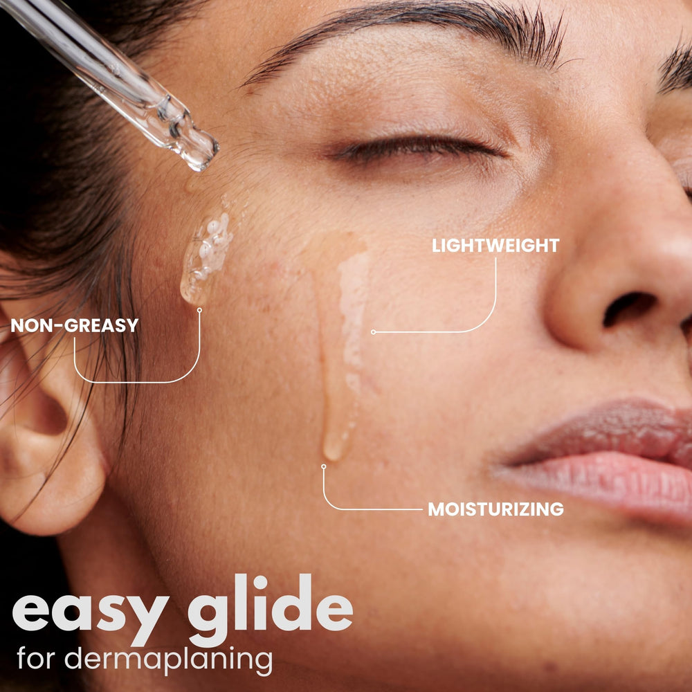 Ouiloe Dermaplane Oil used with a dermaplane razor for comfortable strokes.
