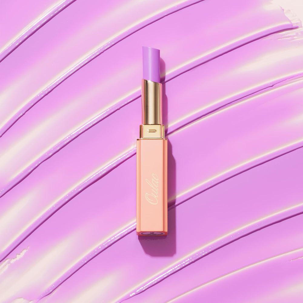 Oulac Pinky Purple lipstick bottle imagery communicates nourishing formula.
