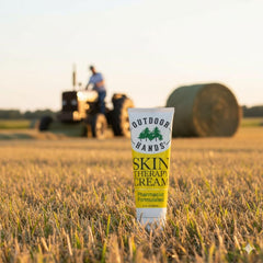 Outdoor Hands Skin Therapy Cream texture closeup emphasizes a smooth, calming formula.