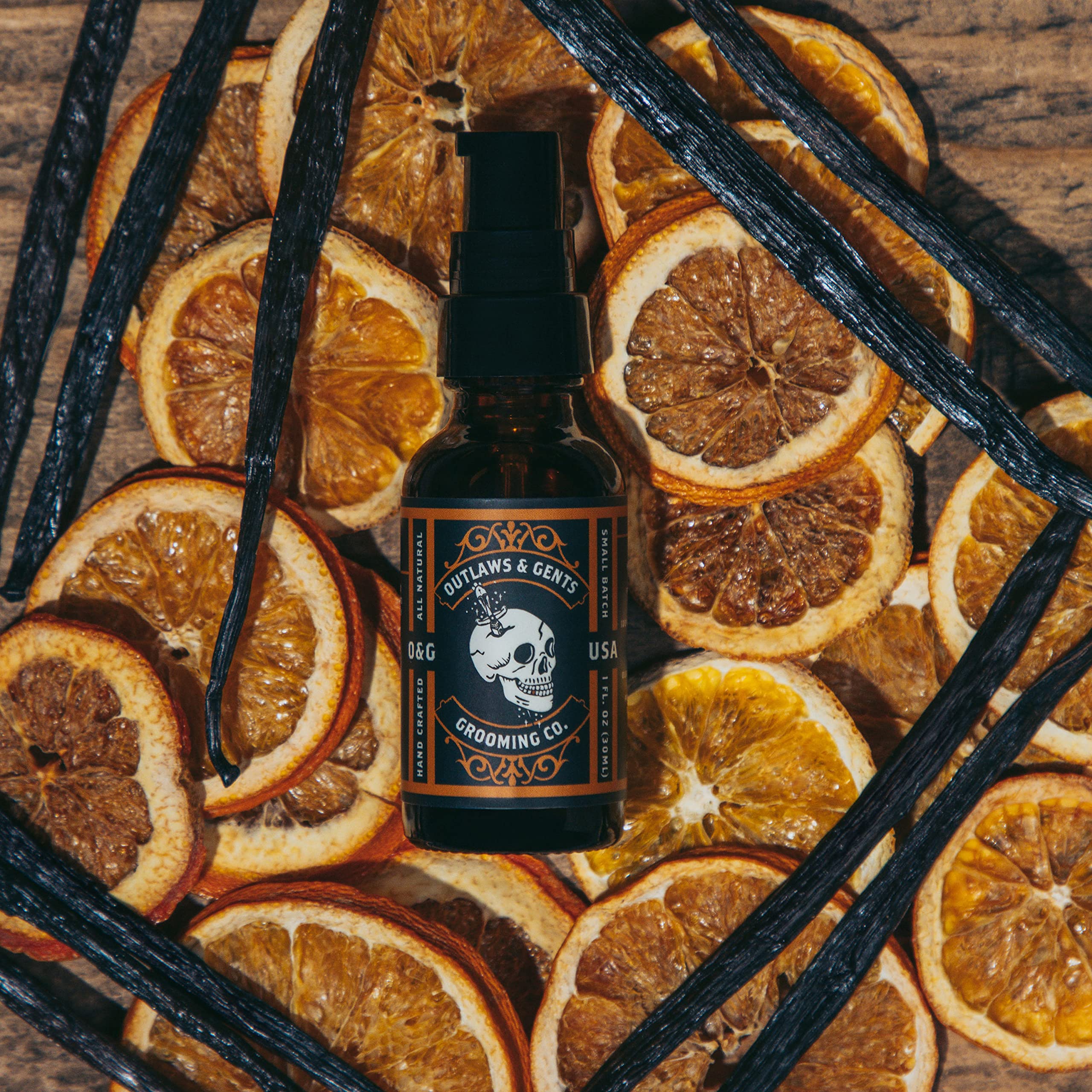 Outlaws & Gents Grooming Co oil packaging closeup: premium natural ingredients.