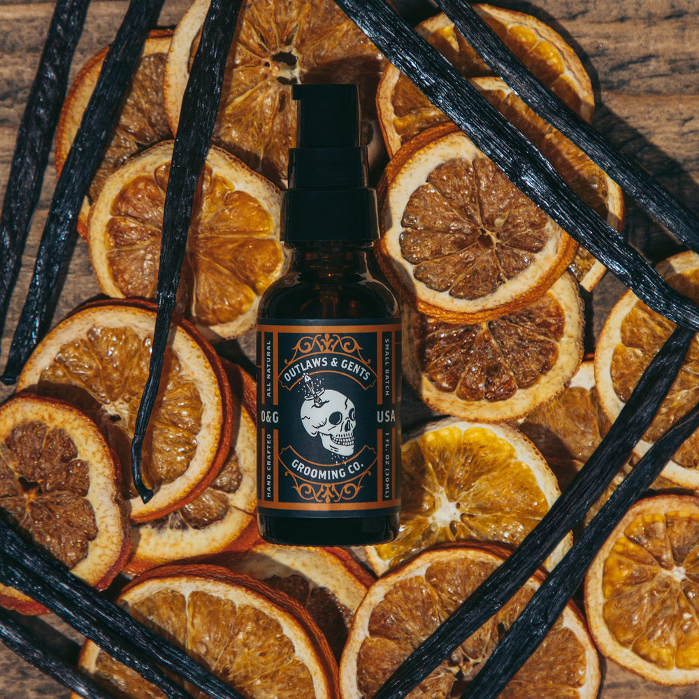 Outlaws & Gents Grooming Co oil packaging closeup: premium natural ingredients.