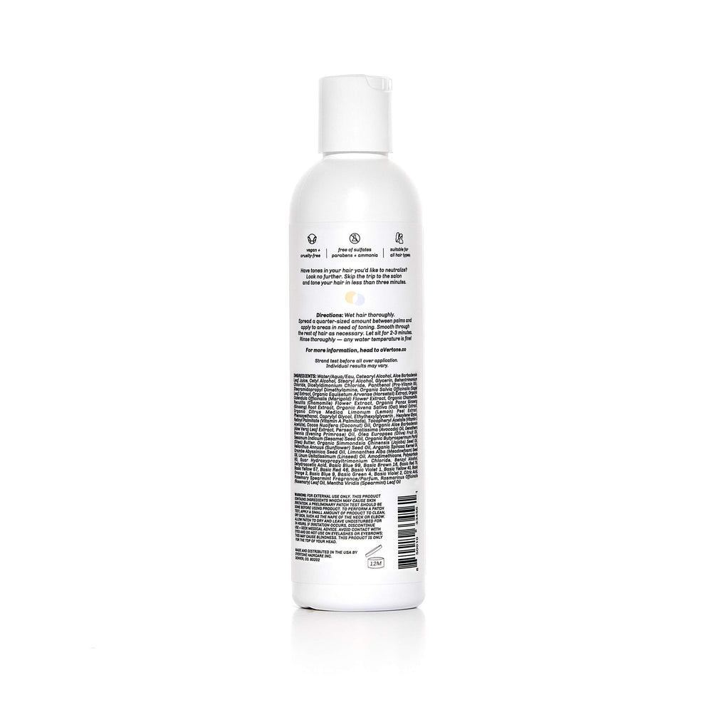 Close-up of the conditioner label highlights blue toning to reduce brassiness
