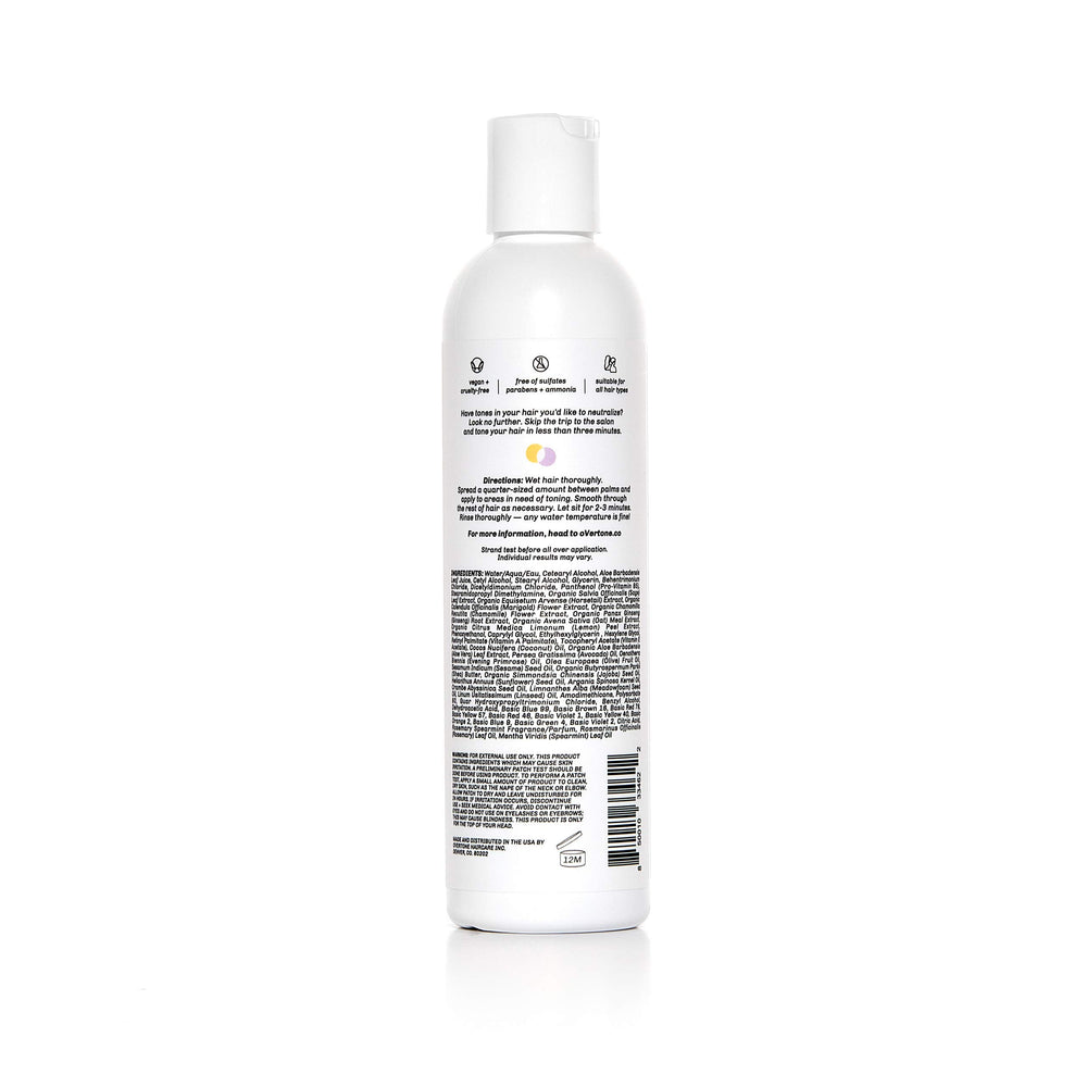 Overtone Purple Toning Conditioner applied to damp hair for brassiness reduction